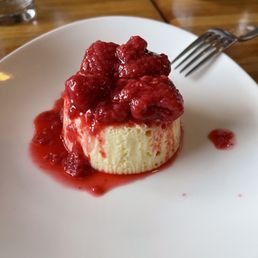 Cheese cake and raspberry sauce.