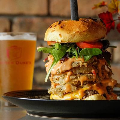 Photo of Tucker Duke's - Deerfield Beach - Deerfield Beach, FL, US. The Tucker Duke Burger just showing off!