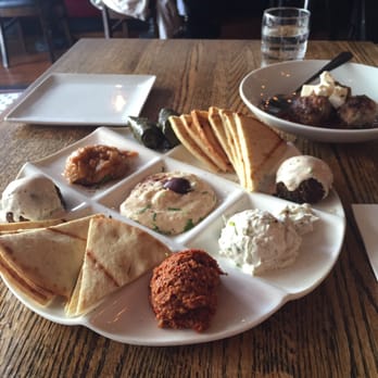 Dunya Bistro - Flavorless mezze platter with tough lamb meatballs in the background - Mediterranean Near Me - San Francisco, California Dunya Bistro - Flavorless mezze platter with tough lamb meatballs in the background - Mediterranean Near Me - San Francisco, California