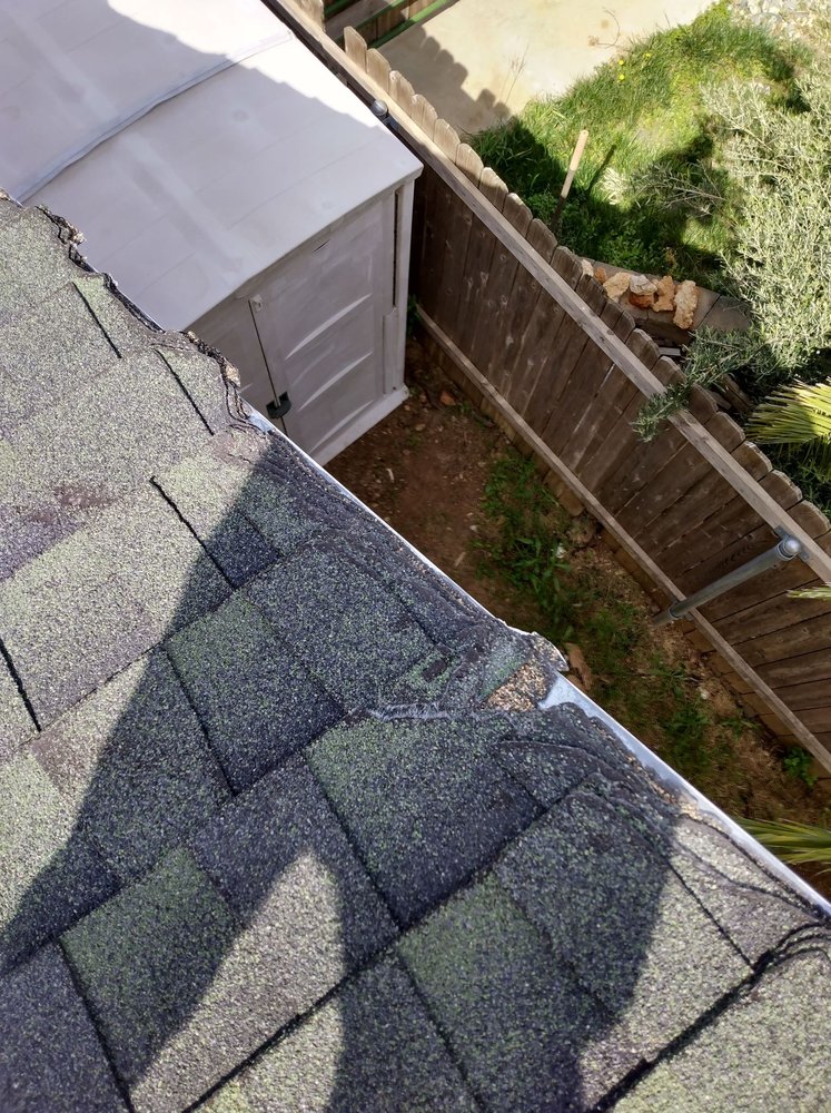 Slide of Hamilton Roofing