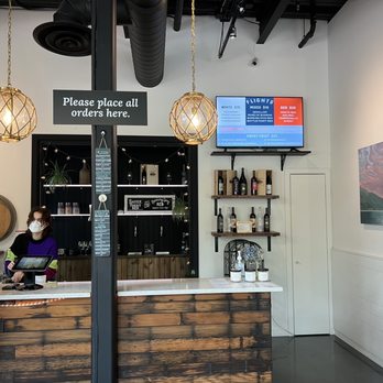 Fletcher Bay Winery - Indoor order area - Wine Tasting Room Near Me - Bainbridge Island, Washington Fletcher Bay Winery - Indoor order area - Wine Tasting Room Near Me - Bainbridge Island, Washington