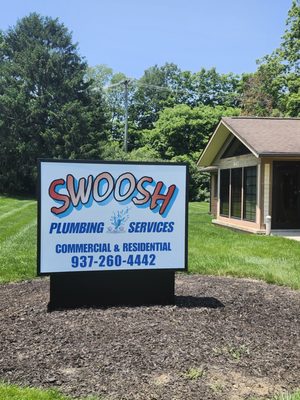 Swoosh Plumbing Services Logo