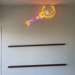 Shelves for records and neon sign