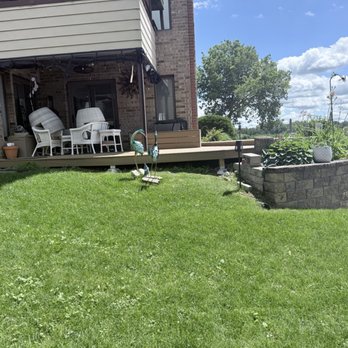 Alonso Landscape Service - This is actually part of their work and it is our retaining wall all along the back and sides of the property. Beautiful - Landscaping Near Me - Middleton, Wisconsin