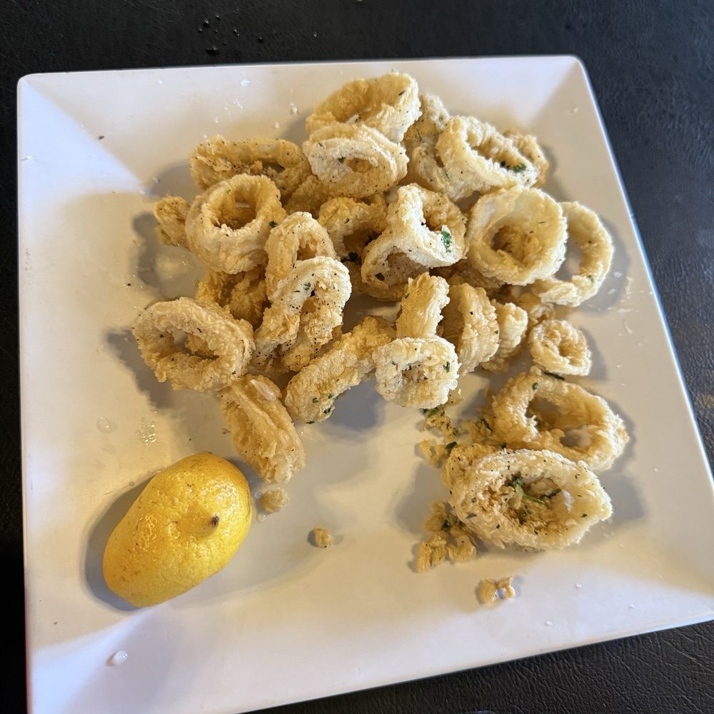Tuscany’s Italian Restaurant - Half eaten calamari soo good - Italian Near Me - Springtown, Texas