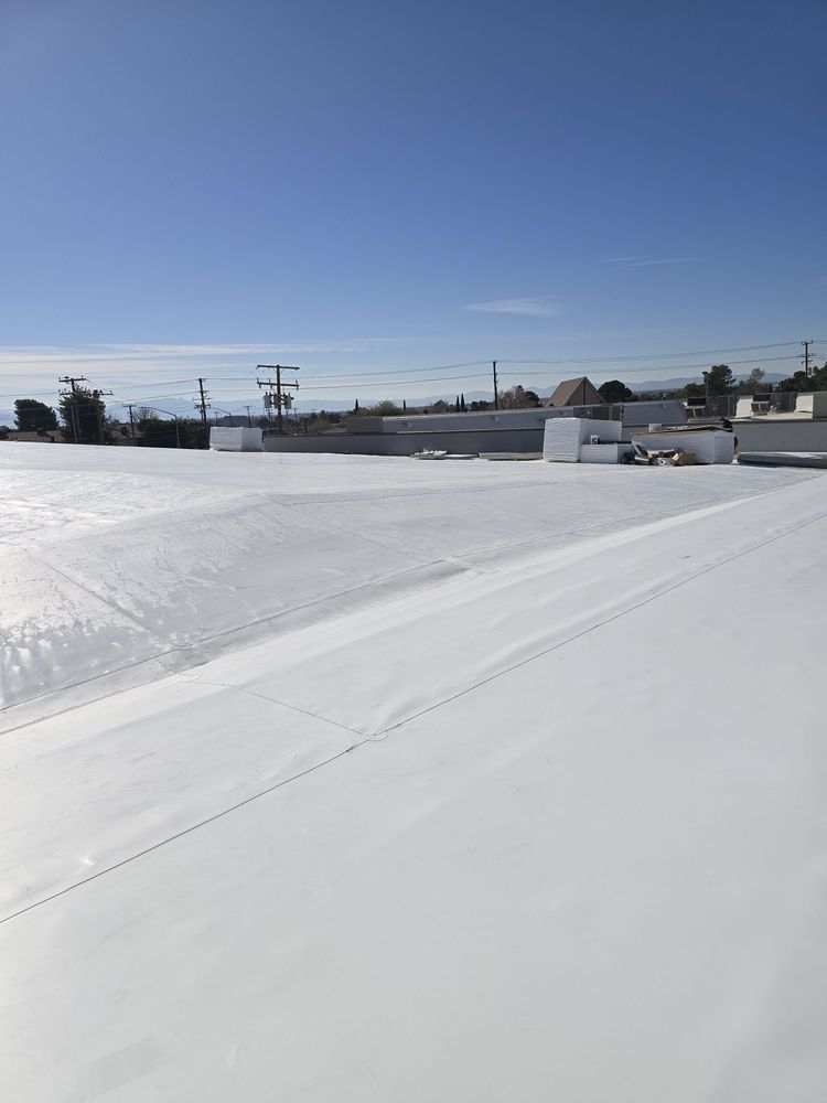 Slide of Do It All Roofing