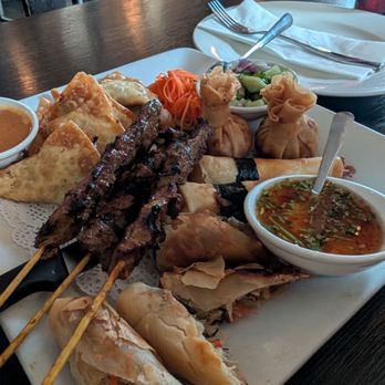 Panvimarn Thai Cuisine - Appetizer sampler featuring spring rolls, beef stay, money aga, fried wontons and wonton wrapped shrimp - Thai Near Me - Long Beach, California