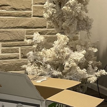 At Home - Tree on box is green with a little frost.  Tree inside is all white, branches were broken, and the top is missing.  FALSE ADVERTISEMENT! - Home Decor Near Me - Elyria, Ohio