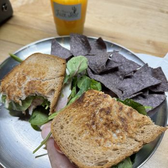 Thania’s Juice Bar - Turkey Avocado sandwich (plus ham) with chips & fresh squeezed OJ - Organic Stores Near Me - Reno, Nevada Thania’s Juice Bar - Turkey Avocado sandwich (plus ham) with chips & fresh squeezed OJ - Organic Stores Near Me - Reno, Nevada