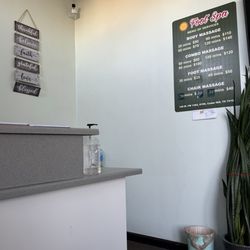Grand Sun Foot Spa - Prices on the wall and a message while you wait.