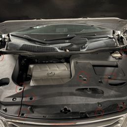 Missing engine cover clips after maintenance.
