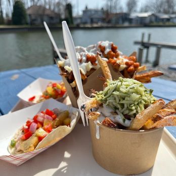 The Chip Ship - Two pickerel tacos, a tiny dill pickle fry, and a regular buffalo chicken poutine - Food Trucks Near Me - Long Point, Ontario