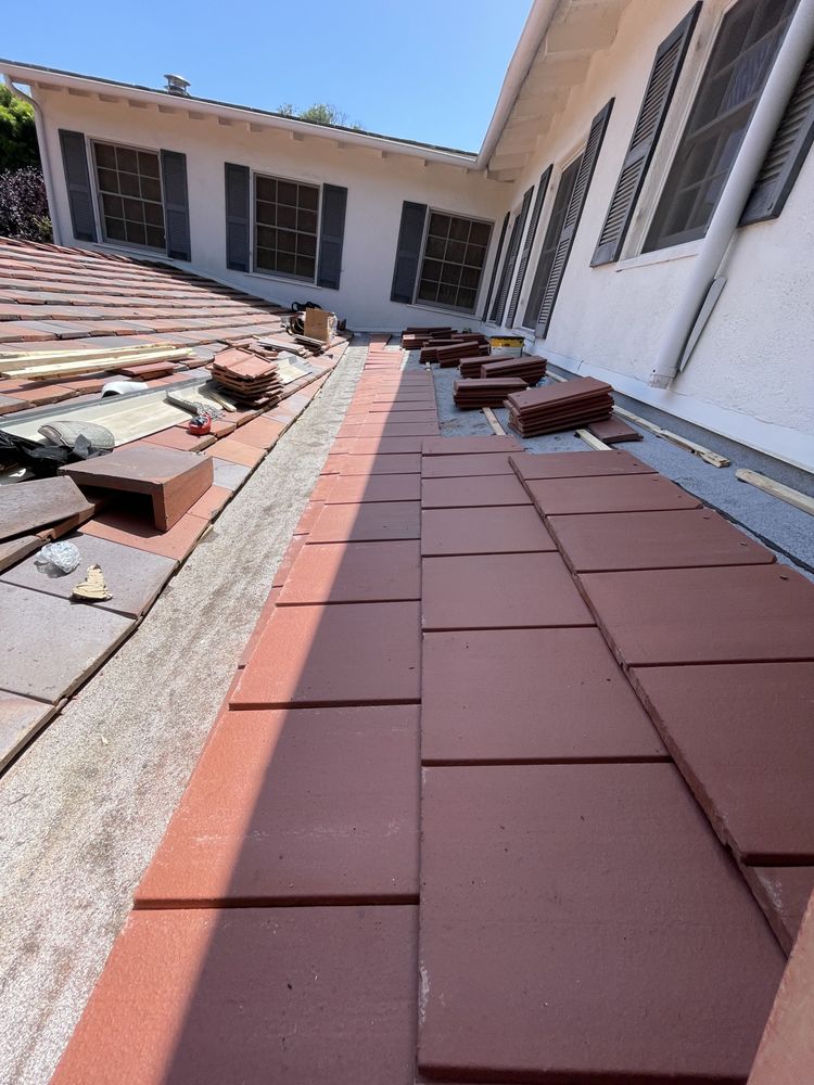 Slide of Dilligent Roofing