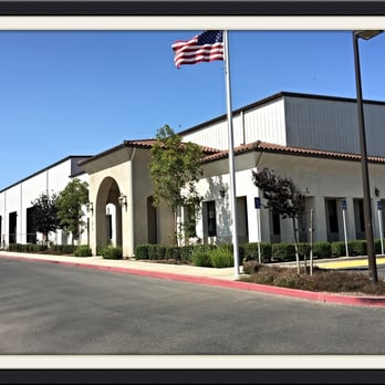 R Macias Landscaping - an american flag flying in front of a commercial building - Landscaping Near Me R Macias Landscaping - an american flag flying in front of a commercial building - Landscaping Near Me
