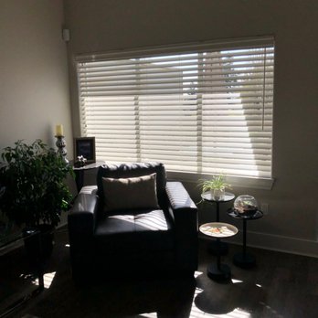 Ruffell & Brown Window Covering Centre - The faux wood blinds in our living room allow us to keep the sunlight off the floors and furniture. - Shades & Blinds Near Me - Victoria, British Columbia