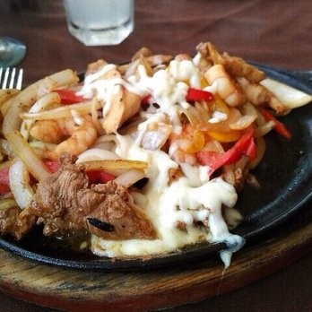 Sayulita Cafe - Sizzling beef chicken and shrimp fajitas. - Seafood Near Me - Sayulita, NAY Sayulita Cafe - Sizzling beef chicken and shrimp fajitas. - Seafood Near Me - Sayulita, NAY