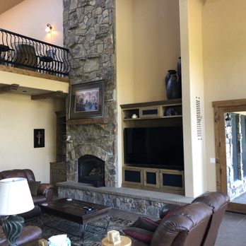 Alpine Villa Retreat - Living room with couches, large television, and very high ceiling. - Vacation Rentals Near Me - Breckenridge, Colorado