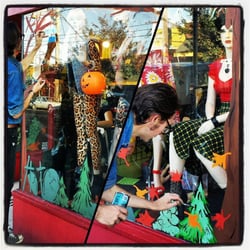 Naked City Clothing - Our very own Matt Stanger painting Halloween/Fall windows 2014.