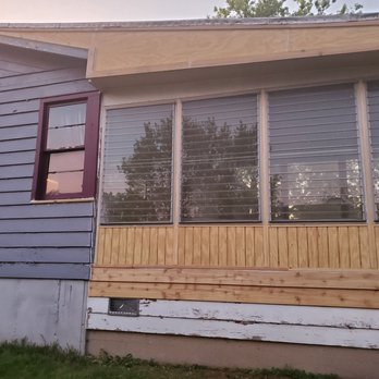 MegaPros - The entire wall, soffit, and facia had to be replaced due to rot and raccoon damage. It's completely sound now and looks great! - General Contractors Near Me - Algonquin, Illinois