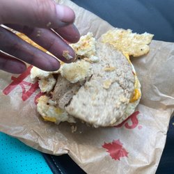 Tim Hortons - Trying to open the sand which to show it. I am legitimately too scared to eat this lol.