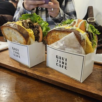 Gavi Bakery & Cafe - Bulgogi Sandwich (left) Salmon Sandwich (right) - Breakfast & Brunch Near Me - Centreville, Virginia Gavi Bakery & Cafe - Bulgogi Sandwich (left) Salmon Sandwich (right) - Breakfast & Brunch Near Me - Centreville, Virginia