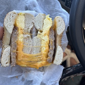 St. Pete Bagel - Egg cheese and sausage with cheddar cheese on everything bagel - Donuts Near Me - Dunedin, Florida