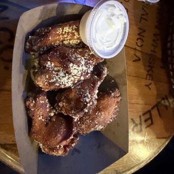 The First Seat - Garlic parm wings - Sports Bars Near Me - Bentonville, Arkansas The First Seat - Garlic parm wings - Sports Bars Near Me - Bentonville, Arkansas