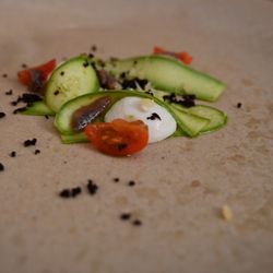 Ca Na Toneta - Zucchini, aged cheese and basil served with black olive tapenade.