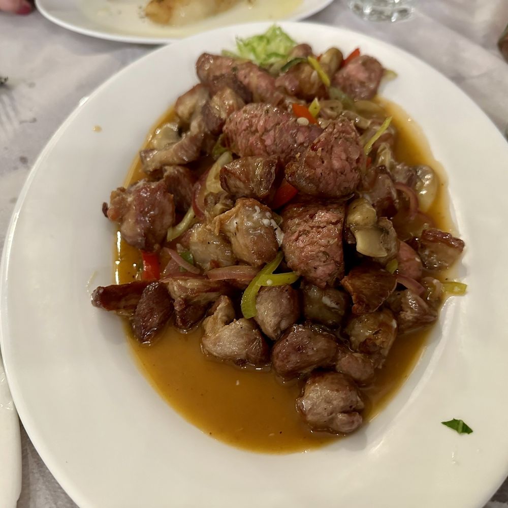 Loukoumi Taverna - Tigania pork and sausage - Greek Near Me - Astoria, New York Loukoumi Taverna - Tigania pork and sausage - Greek Near Me - Astoria, New York