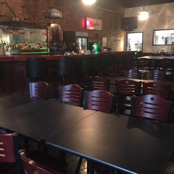 Rayz Route 20 - empty tables and chairs in a restaurant - Chicken Wings Near Me - Bellevue, Ohio Rayz Route 20 - empty tables and chairs in a restaurant - Chicken Wings Near Me - Bellevue, Ohio