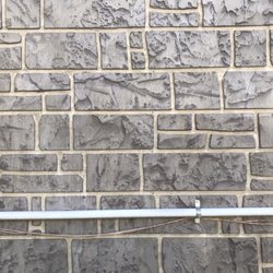 Murphy Construction & Home Repair - Overlay work on side of a house
