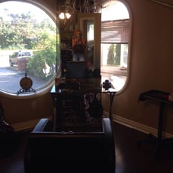 House of Ten Thousand Picture Frames - One of 2 frameless mirrors made for me mounted on existing chrome bases.