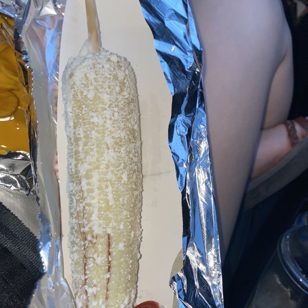 Los Pinguinos Snack - Their elote entero also barely had any crema or mayo or cheese - American Near Me - Laredo, Texas