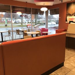 the inside of a dunkin donuts restaurant the inside of a dunkin donuts restaurant