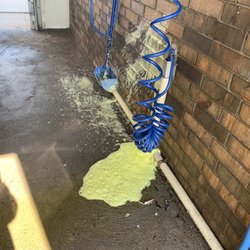 A & D Kwik Kar Wash - Broken nozzle, no water pressure, soap spilling onto the ground.