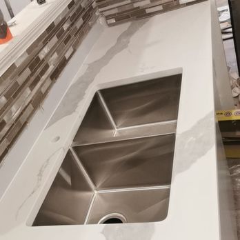 5 star Basement - a stainless steel sink in a kitchen - General Contractors Near Me