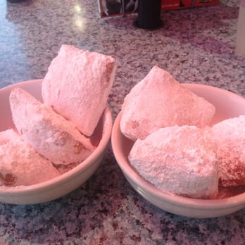 Roux Dat - Beignets with a side of housemade caramel sauce - Cajun/Creole Near Me - Capitola, California Roux Dat - Beignets with a side of housemade caramel sauce - Cajun/Creole Near Me - Capitola, California