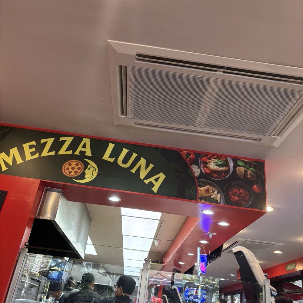 Mezza Luna Pizza - Inside - Pizza Near Me - Bronx, New York Mezza Luna Pizza - Inside - Pizza Near Me - Bronx, New York