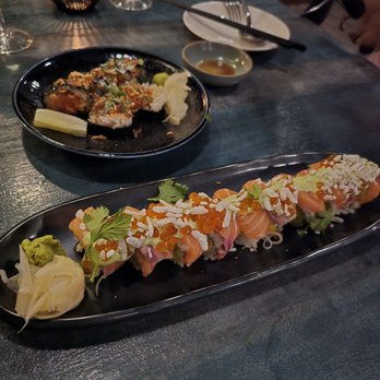 Sado - Crying Tiger (round plate) Nikkei Maki, (oblong plate) - Sushi Bars Near Me - St. Louis, Missouri Sado - Crying Tiger (round plate) Nikkei Maki, (oblong plate) - Sushi Bars Near Me - St. Louis, Missouri