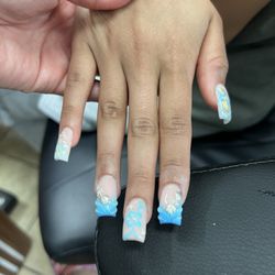 T C Nails