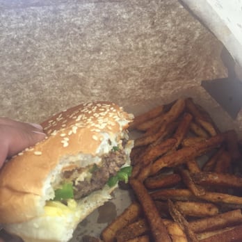 Five Guys - Making my way through this burger and Cajun fries. - Burgers Near Me - Mississauga, Ontario