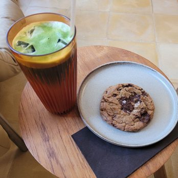 Carpet Cafe - Matcha Latte with Tamarind Syrup & a Chocolate Chip Cookie - Coffee & Tea Near Me - Baltimore, Maryland Carpet Cafe - Matcha Latte with Tamarind Syrup & a Chocolate Chip Cookie - Coffee & Tea Near Me - Baltimore, Maryland