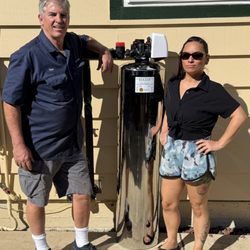 Sacramento Water Filtration - Trustworthy Troy with a Sacramento homeowner after installing her new HALO 5 whole house filtration system. Clear water from every tap!