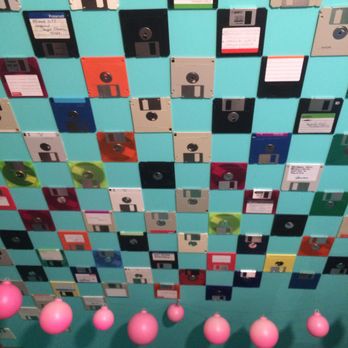 La Graine Brûlée - Floppy disk wall next to Nintendo corner. - Cafes Near Me - Montreal, Quebec
