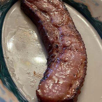 Peter Luger - Luger's Sizzling Bacon, Extra Thick by the Slice - Steakhouses Near Me - Brooklyn, New York Peter Luger - Luger's Sizzling Bacon, Extra Thick by the Slice - Steakhouses Near Me - Brooklyn, New York