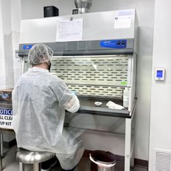 Richmond Hill Pharmacy - Our compounding pharmacist making capsules!