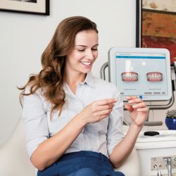 Summit Orthodontics - Invisalign patient - Itero scanner