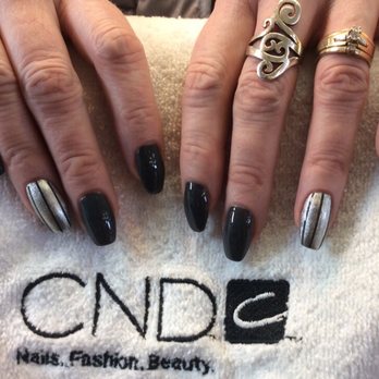 Adorable Nails and More - Liquid and powder enhancement finished with CND Shellac in Indigo Frock and feature striping with Pave Diamonds. - Waxing Near Me - Powell River, British Columbia