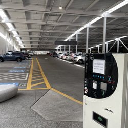 Seattle Center-5th Ave Garage - Charging stations are along the left side, follow the yellow sidewalk