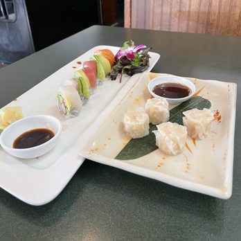 Frankie Sushi - Left side - rainbow roll. Right side - shumai. I'd eaten two pieces off each plate before I took the picture! - Japanese Near Me - Clay, New York Frankie Sushi - Left side - rainbow roll. Right side - shumai. I'd eaten two pieces off each plate before I took the picture! - Japanese Near Me - Clay, New York